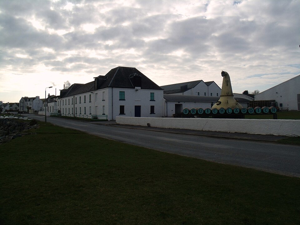 The gates and courtyard of Bruichladdich distillery on the shore of Loch Indaal, Islay