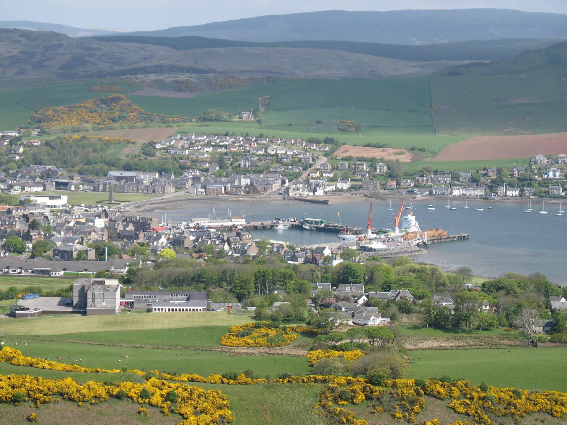 Campbeltown and its harbour seen from the slopes of Beinn Ghuilean