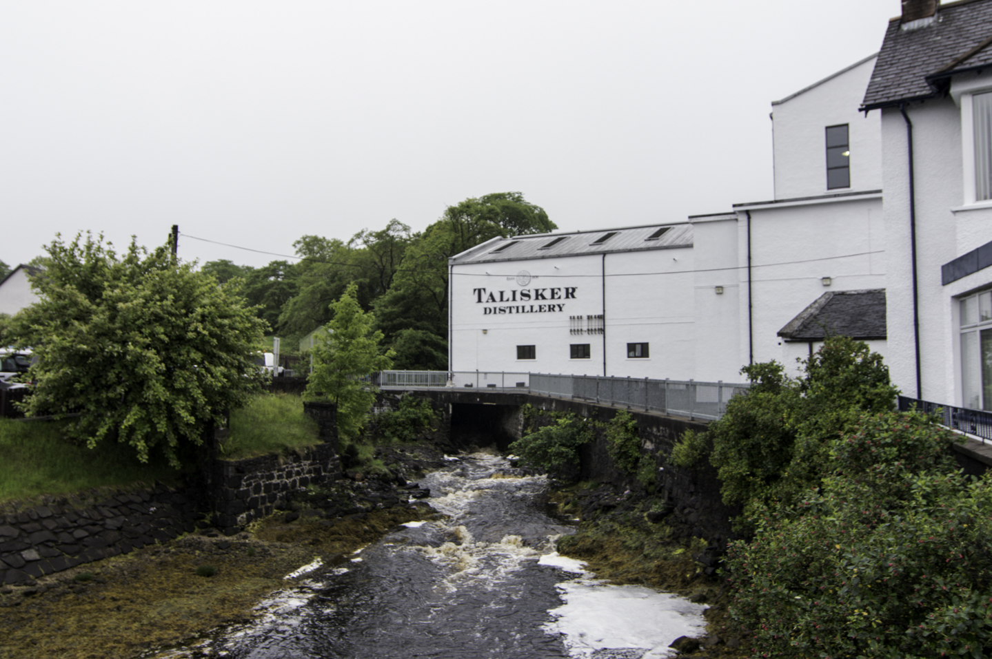 Talisker distillery on the shore of Loch Harport, Isle of Skye