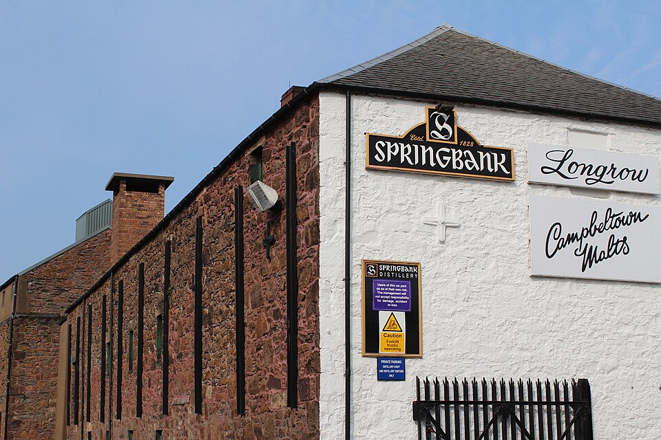 The whitewashed buildings of Springbank distillery on Well Close, Campbeltown
