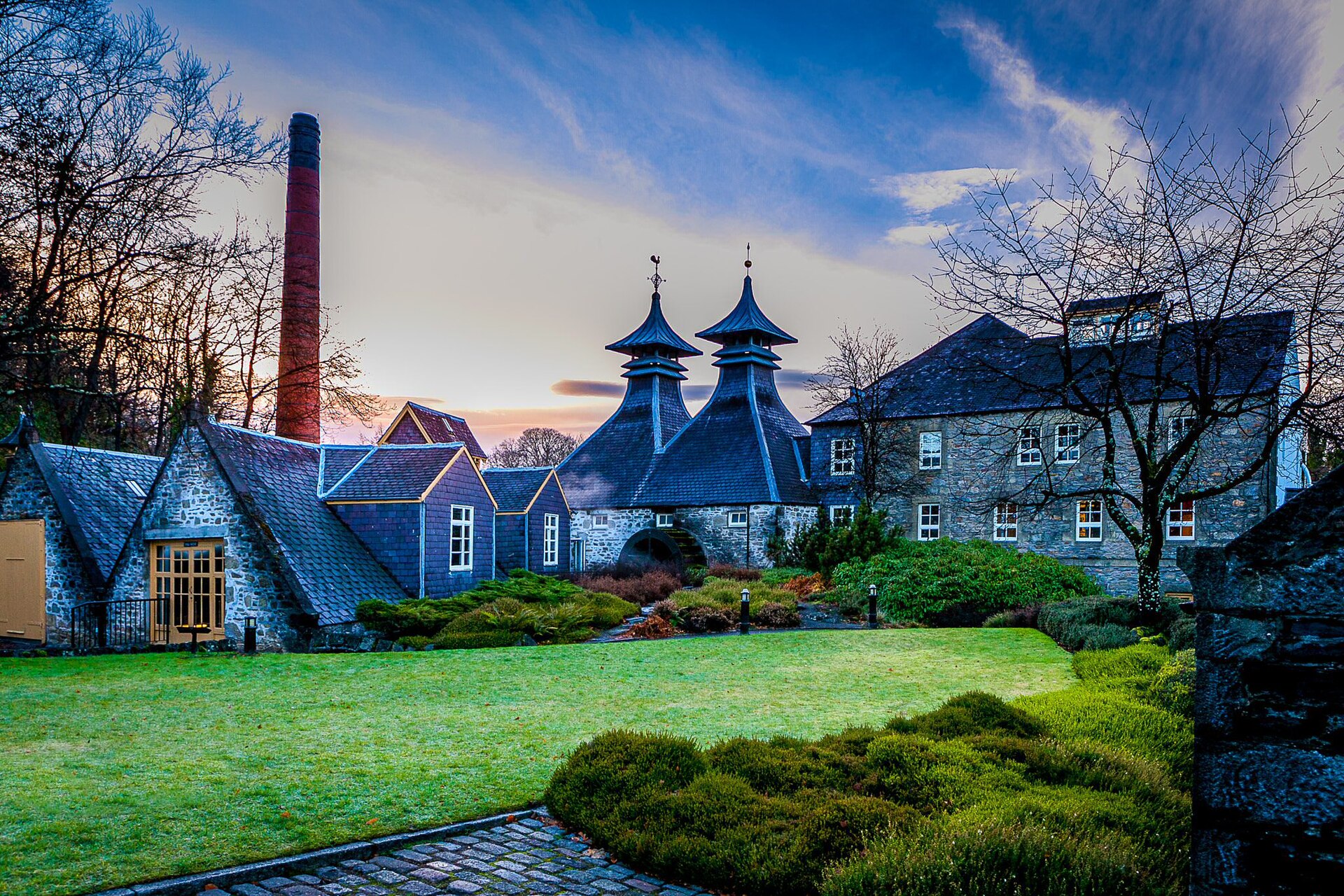 The pagoda roofs and stone frontage of Strathisla distillery at Keith